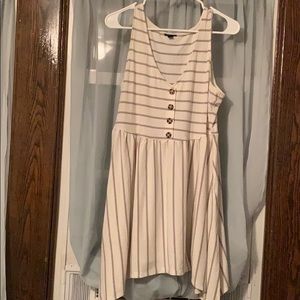 Shark bite hem sleeveless top